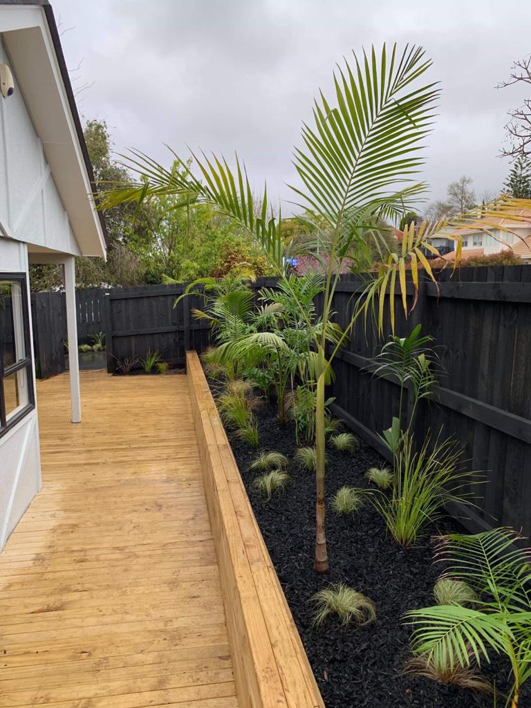 home with new deck and outdoor living area